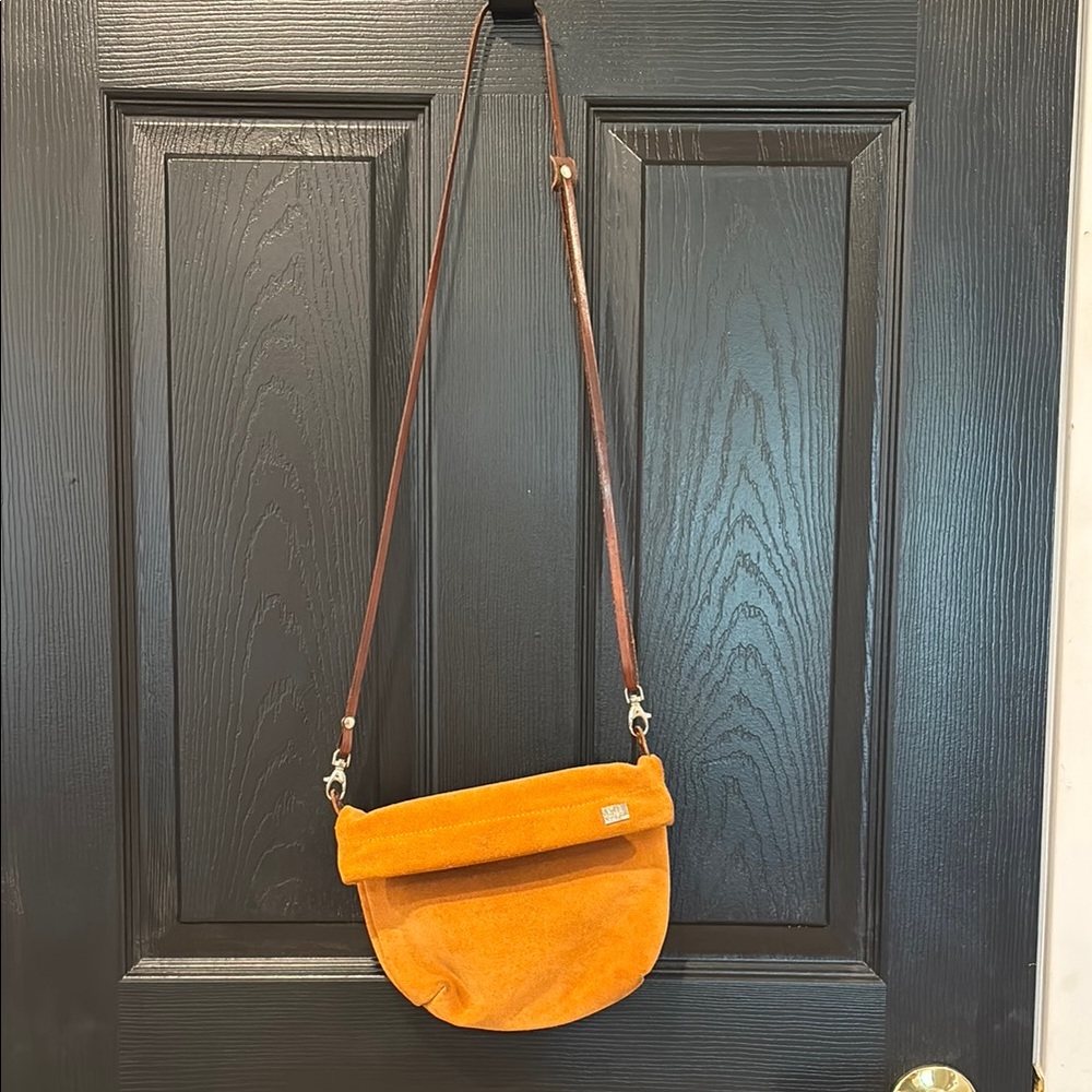 Chic Orange Crossbody Bag with Brown Strap